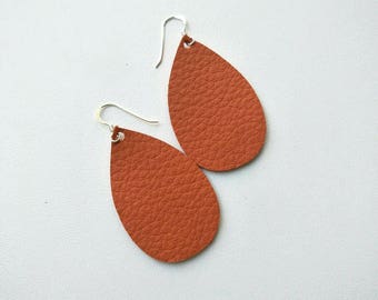 Leather Earrings- Mini Drop in persimmon orange print. Hypoallergenic sterling silver hooks. Light weight earrings.