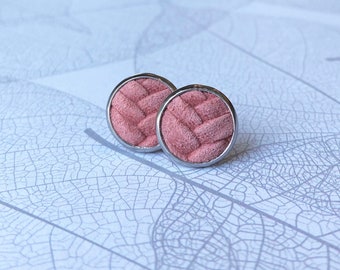 Leather studs in blush pink braided print. Hypoallergenic surgical stainless steel bezel.