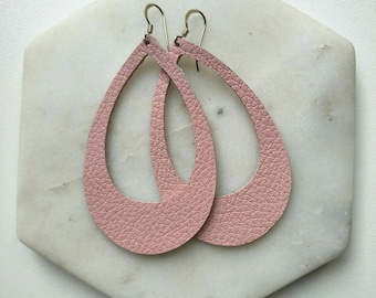 Leather Earrings- Silhouette blush pink print. Hypoallergenic sterling silver hooks. Light weight earrings.
