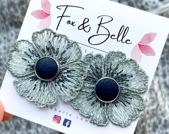 Daisy studs. Green floral earrings with navy leather stud centre. Fabric earrings. Floral studs. Hypoallergenic stud earrings. Flower studs.
