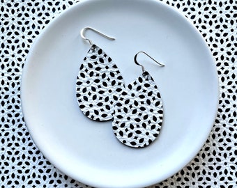 Leather Earrings- Mini Drop in black and white fleck print. Hypoallergenic sterling silver hooks. Light weight earrings.