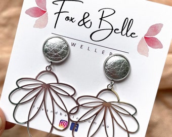 Silver floral dangle earrings with 10mm silver leather stud. Hypoallergenic stainless steel. Silver dangle earrings. Butterfly back.