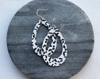 Leather Earrings- MINI Silhouette snow leopard print. Hypoallergenic sterling silver hooks. Light weight earrings.