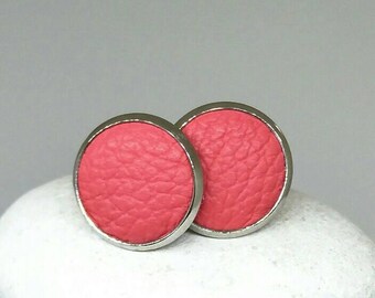 Leather studs in coral print. Hypoallergenic surgical stainless steel bezel.
