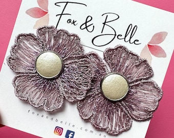 Daisy studs in purple. Floral earrings with leather stud centre. Fabric earrings. Floral studs. Hypoallergenic stud earrings. Flower studs.