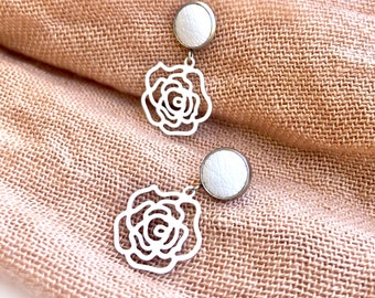 White rose dangle earrings with 10mm leather stud. Hypoallergenic stainless steel. Butterfly back.