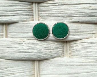 Leather studs in emerald green suede print. Hypoallergenic surgical stainless steel bezel.