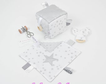 Box, Montessori-inspired games, awakening cube, natural wood teething ring and matching blanket white stars gray and silver
