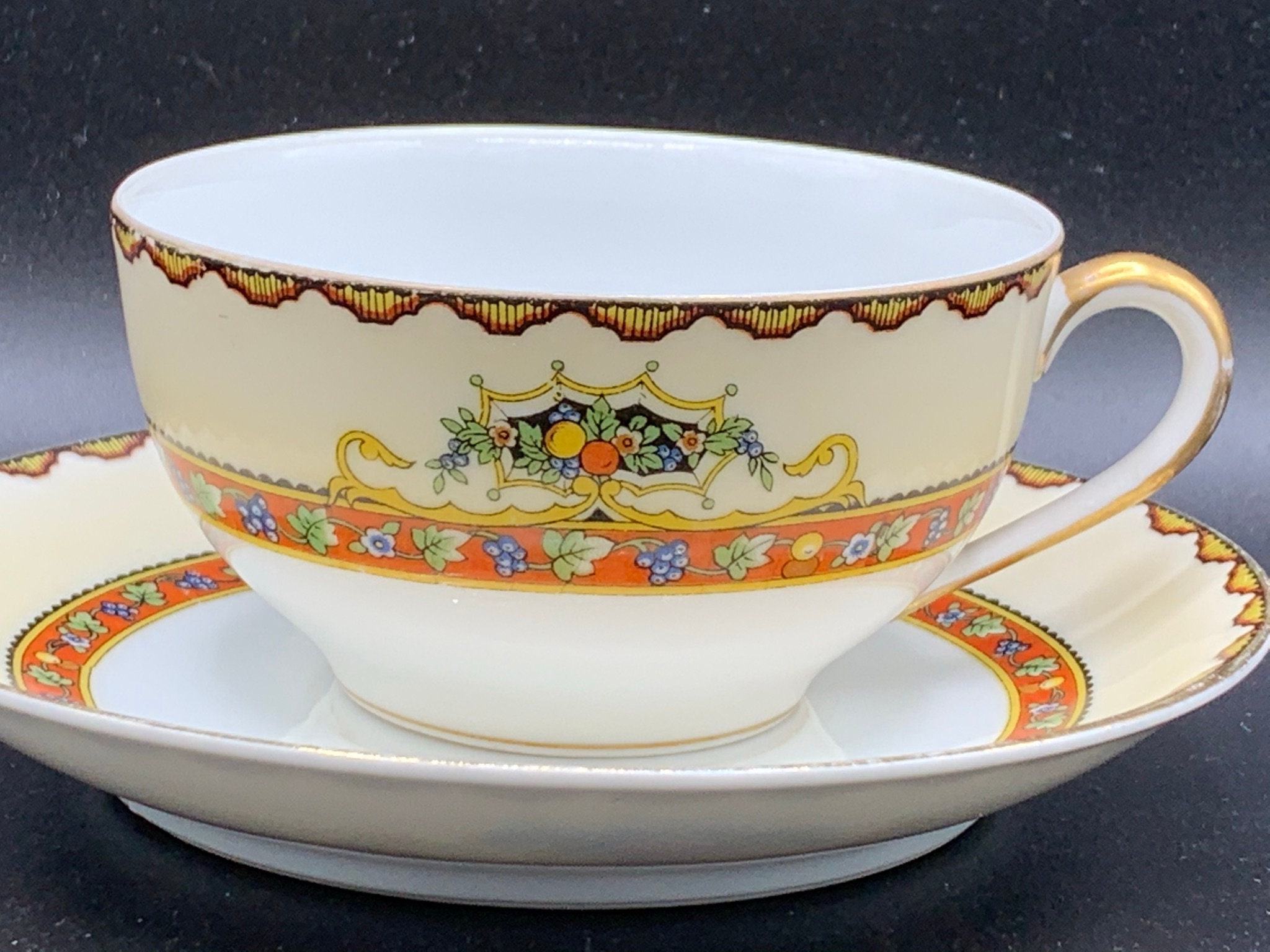 Vintage Noritake Iona Cup and Saucer Set: White With Orange Fruit