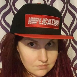 Implication Flat Bill Cap