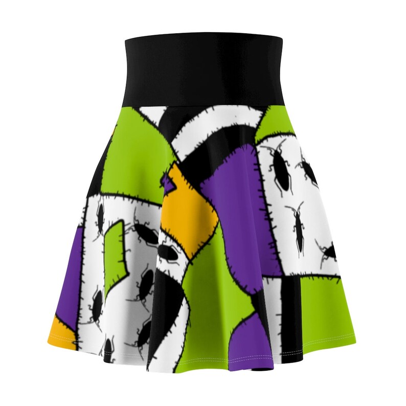 May include: A black, green, purple, white, and yellow patchwork skirt with a black waistband. The skirt has a pattern of stitched squares with bugs on them.