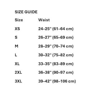 May include: A black and white size guide chart listing waist measurements in inches for sizes XS through 3XL. The text reads: SIZE GUIDE, Size, Waist, XS 24-25", S 26-27", M 28-29", L 30-32", XL 33-35", 2XL 36-38", 3XL 39-42".