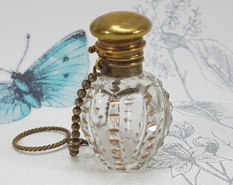 Antique French cut glass scent bottle for a chatelaine, small scent bottle with hinged gilt lid and finger chain