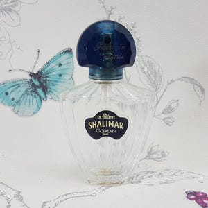 Vintage Guerlain Shalimar-parfumflesje: leeg glazen display
