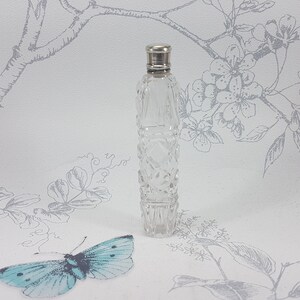 Antique Georgian cut glass perfume flask with silver lid and original glass stopper