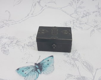 Antique trinket box, French antique fabric lined metal trinket casket with strapwork and push button fleur de lys clasp