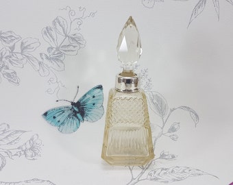 Antique cut glass perfume bottle, Art Deco silver collared cut glass scent bottle with original stopper, London 1924