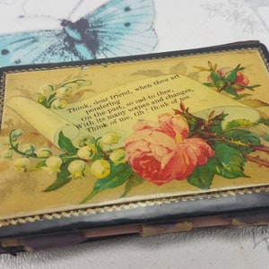 May include: A vintage black and gold keepsake box with a floral design and a scroll with the text "Think, dear friend, when thou art pondering On the past, so sad to thee, With its many scenes and changes, Think of me, th! think of me" and the word "Patent".
