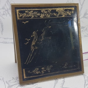 Cipria compatta Art Déco vintage: Lucite nera e oro