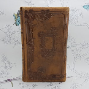 Antique Victorian photo album containing 80 plus antique photographs, Art Nouveau tooled brown leather photograph album