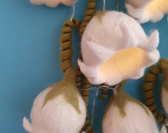 String of lights with felted bluebells white