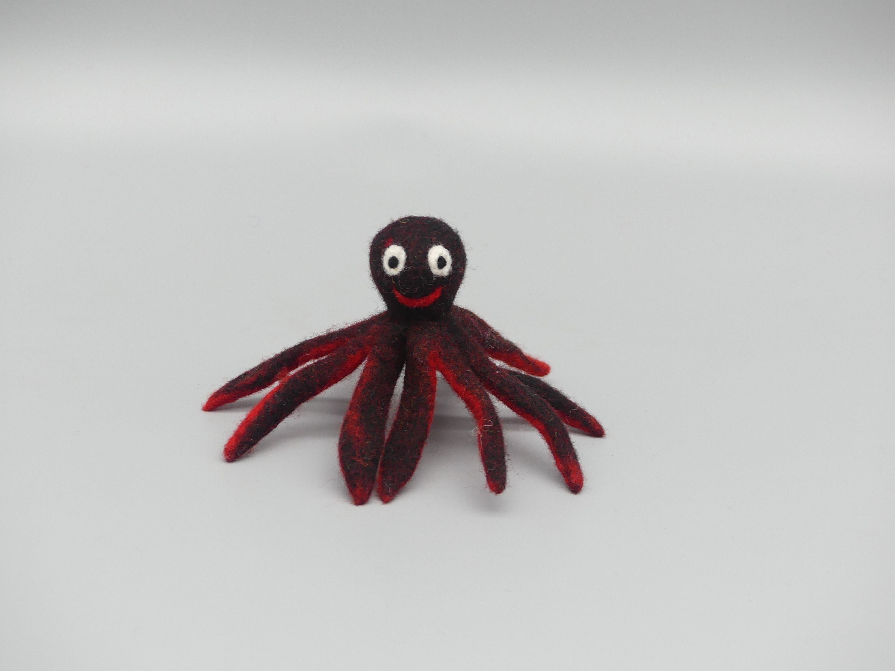 Felted octopus for school enrollment pen topper
