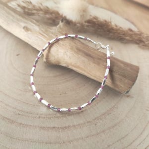 Delicate sterling silver bracelet with rubies, Karen Hill tribe design, and semi-precious stones. Gift for women.