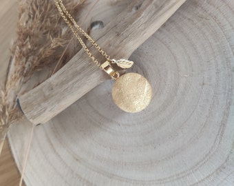 Gold sandblasted pregnancy bola and stainless steel feather. Gift for mother-to-be. Gift for pregnant women.