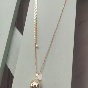gold pregnancy bola with mother-of-pearl heart and freshwater pearl. image 5