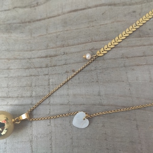 gold pregnancy bola with mother-of-pearl heart and freshwater pearl. image 3