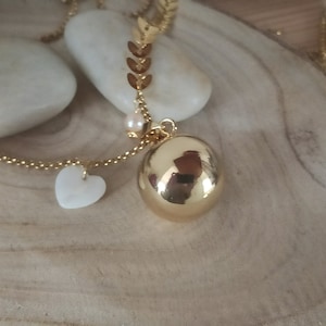 gold pregnancy bola with mother-of-pearl heart and freshwater pearl. image 2