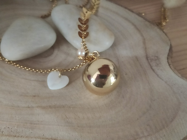 gold pregnancy bola with mother-of-pearl heart and freshwater pearl. image 2