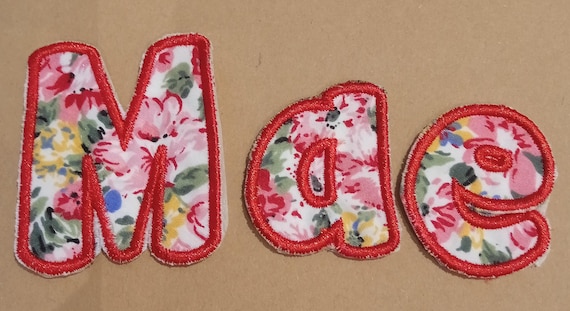 red iron-on alphabet letter to personalize