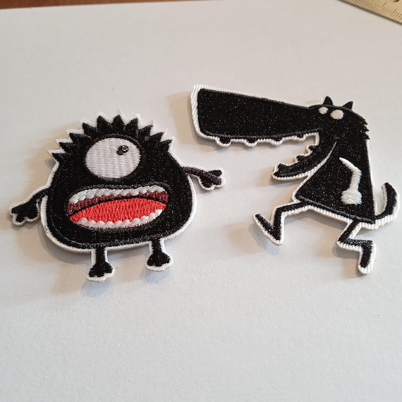 black monster embroidered iron-on patch