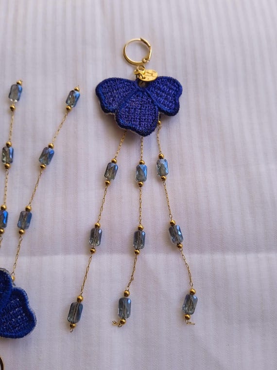 leaf and blue charm earrings