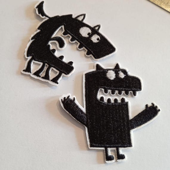 black monster embroidered iron-on patch