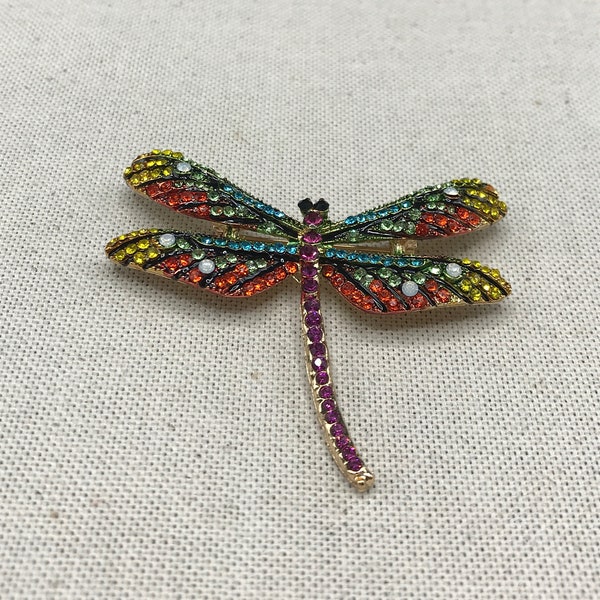 Multicolored dragonfly brooch