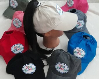 baseball hat with hole on top