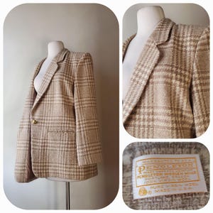 May include: A tan and cream plaid blazer displayed on a mannequin. The blazer has a single gold button closure and a classic notched lapel. The label reads "Pendleton Woolen Mills, 100% Virgin Wool, Made in USA."