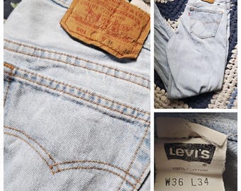 90s Levis 501 boyfriend jeans USA made light denim distressed men's unisex button fly 34" waist