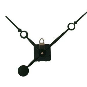 May include: Black clock hands and movement on a white background. The hands are thin and pointed, with decorative elements near the center. The clock movement is square with a metal loop.