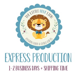 May include: A blue and white circular logo with a cartoon lion wearing a blue bow tie. The text "THE LITTLE BLUE LION" is written in a circle around the lion. The text "CUSTOM BABY & CHILD GIFTS" is written below the lion. The text "EXPRESS PRODUCTION" is written below the logo. The text "1-2 BUSINESS DAYS + SHIPPING TIME" is written below the text "EXPRESS PRODUCTION".