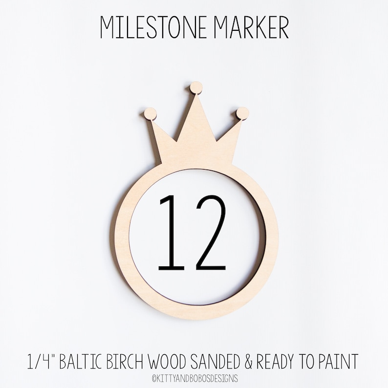 May include: A wooden milestone marker with a crown on top and the number 12 in the center. The marker is 1/4 inch thick and made of Baltic birch wood. It is sanded and ready to paint.