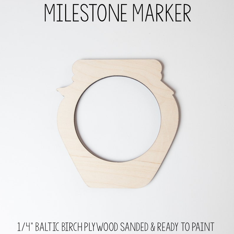 May include: A wooden jar-shaped cutout, 1/4 inch thick, made of Baltic birch plywood. The cutout is sanded and ready to paint.  It is a blank canvas for a milestone marker.