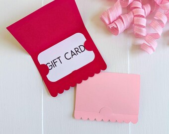 May include: A red gift card holder with a scalloped edge and a white insert that reads "GIFT CARD". A smaller pink gift card holder is next to it. Pink ribbon curls are in the background. The image also includes the text "SVG • DXF • PNG • JPG".