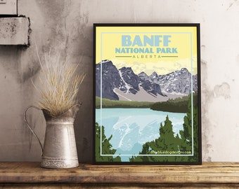 May include: A vintage-style poster with a yellow background featuring a scenic view of Banff National Park in Alberta, Canada. The poster has the text "Banff National Park - Alberta" in blue and white lettering.