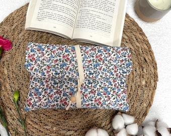 Paperback book and large flower book