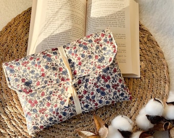 Paperback book and large flower book