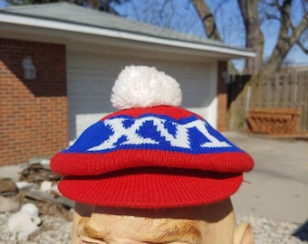 baseball cap with puffball
