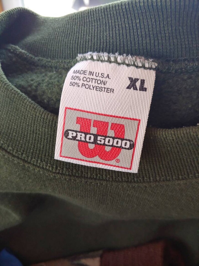 90s Wilson Pro 5000 small logo stitched graphic green pullover sweatshirt size LXL made in USA vtg vintage